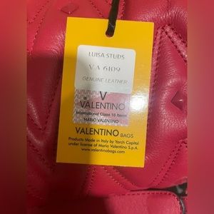 I am selling a brand new Valentino by Mario Valentino bag. Lusia Diamond Leather